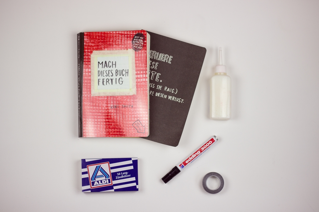 Mach dieses Buch fertig Flat lay